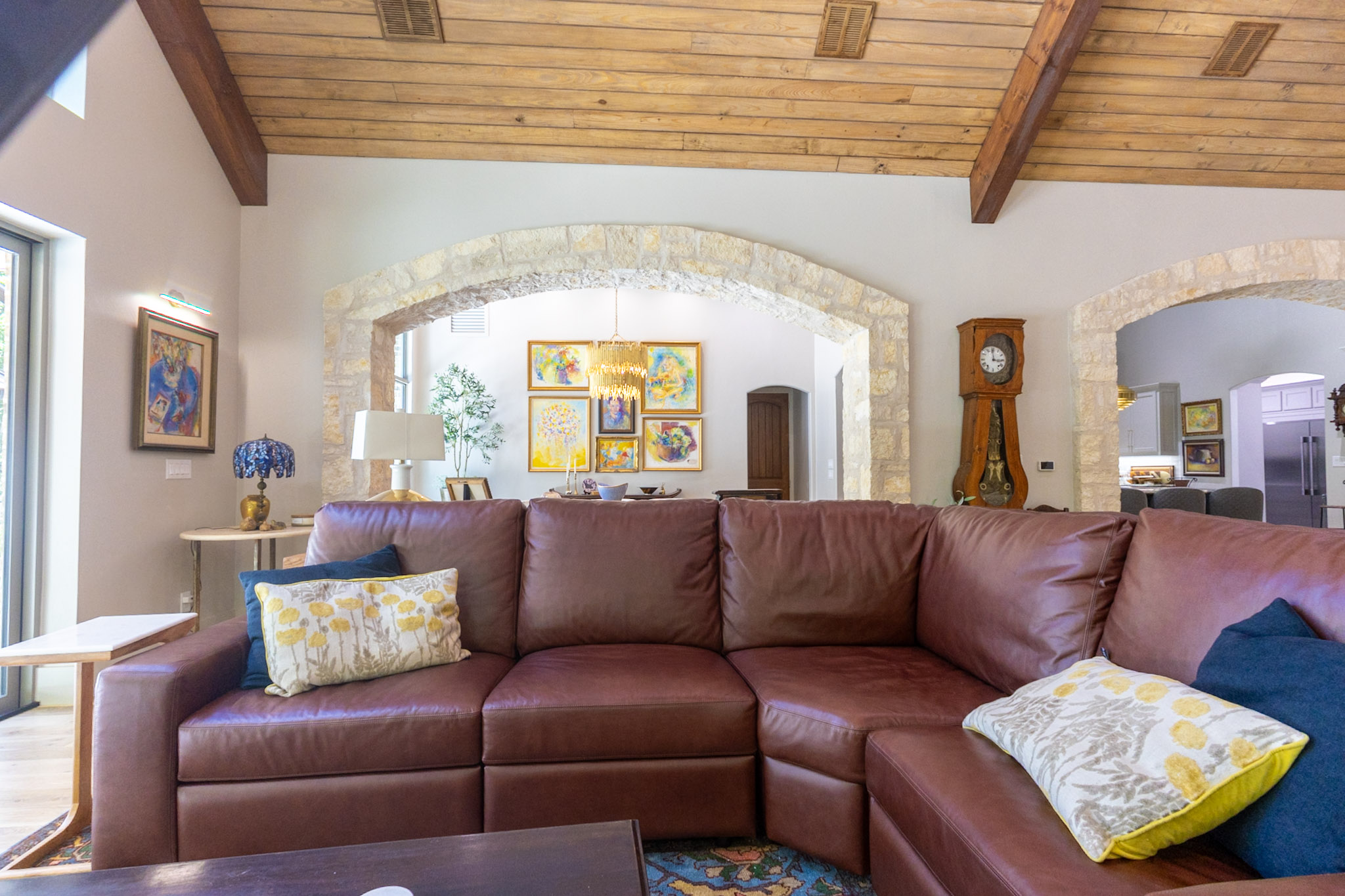 Stone Archway Connecting Living and Dining Areas
