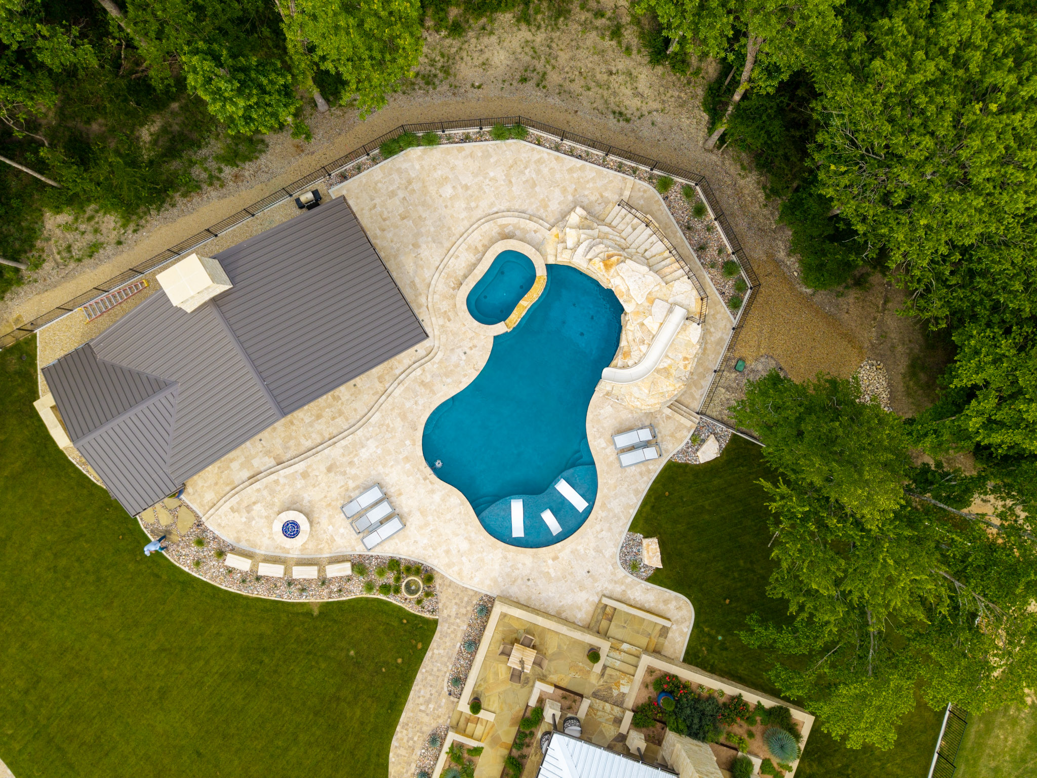Top-down aerial view of master-planned pool and landscape design in Weston, TX