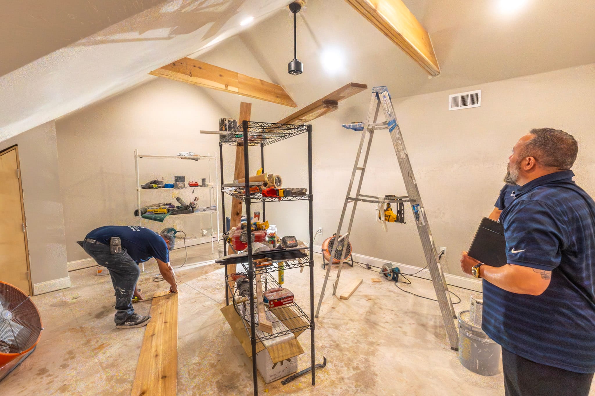 House of Renovations crew working inside an attic addition in The Colony, Texas