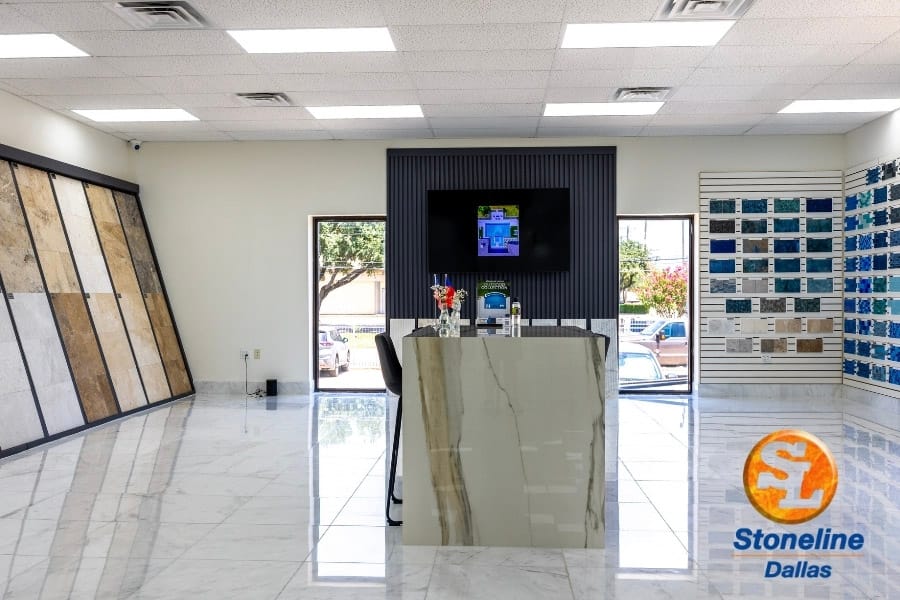 Showroom counter centered between tile and surface displays