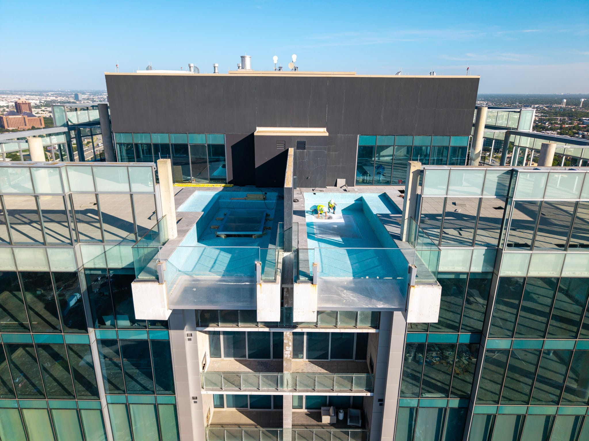 Upper levels of Bleu Ciel with elevated pools visible near the roof