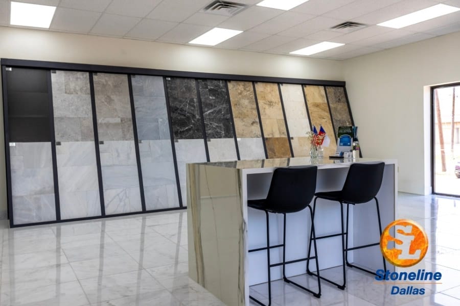 Large-format gray, white, black and tan surface samples on display